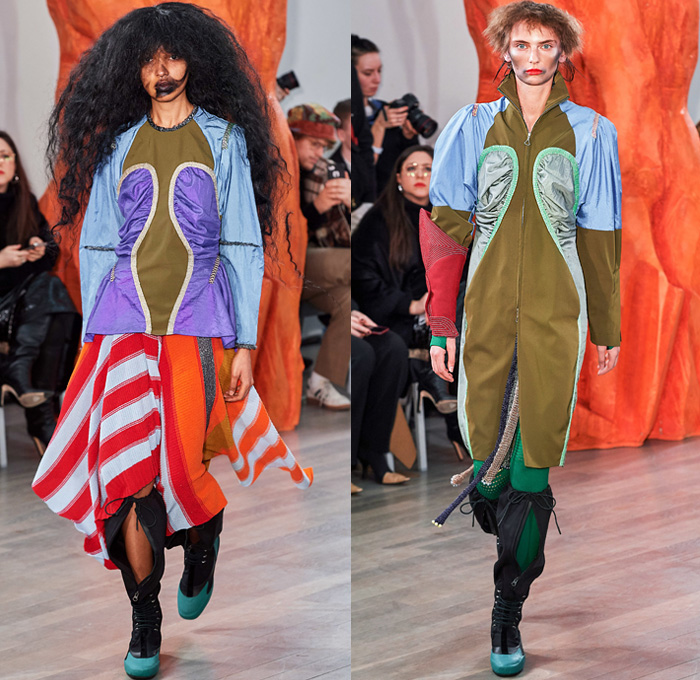 Kiko Kostadinov 2019-2020 Fall Autumn Winter Womens Runway Catwalk Looks - London Fashion Week Collections UK - Troll Doll Hair Knitwear Fringes Bib Turtleneck Gauntlet Arm Sleeve Poufy Shoulders Holes Dress Coat Velvet Knee Panels Stripes Skirt Grapes Scarf Cinch Draped Corduroy Angular Hem Nylon Asics Camper Drawstring Boots