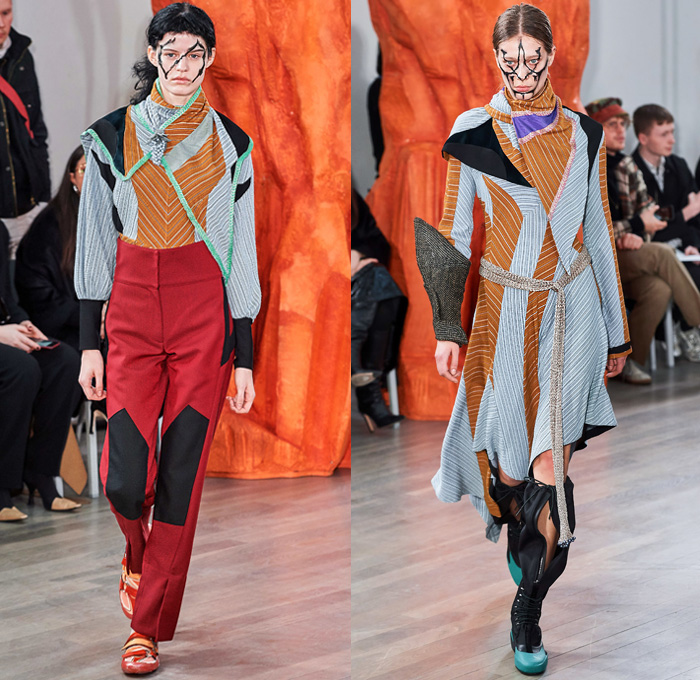 Kiko Kostadinov 2019-2020 Fall Autumn Winter Womens Runway Catwalk Looks - London Fashion Week Collections UK - Troll Doll Hair Knitwear Fringes Bib Turtleneck Gauntlet Arm Sleeve Poufy Shoulders Holes Dress Coat Velvet Knee Panels Stripes Skirt Grapes Scarf Cinch Draped Corduroy Angular Hem Nylon Asics Camper Drawstring Boots