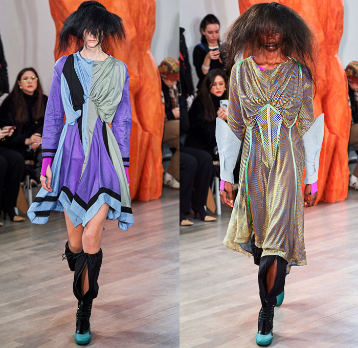 Kiko Kostadinov 2019-2020 Fall Autumn Winter Womens Runway Catwalk Looks - London Fashion Week Collections UK - Troll Doll Hair Knitwear Fringes Bib Turtleneck Gauntlet Arm Sleeve Poufy Shoulders Holes Dress Coat Velvet Knee Panels Stripes Skirt Grapes Scarf Cinch Draped Corduroy Angular Hem Nylon Asics Camper Drawstring Boots