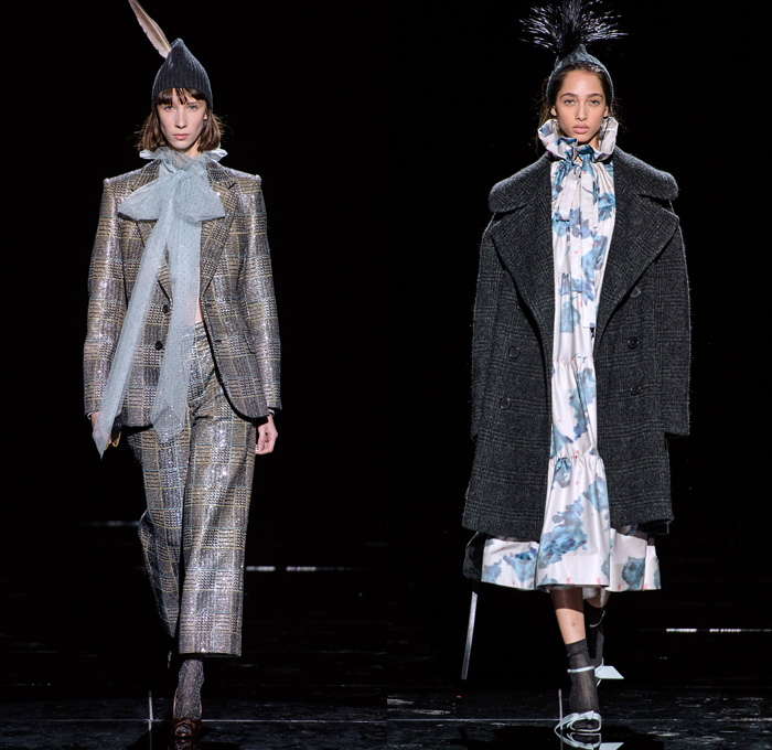 Marc Jacobs 2019-2020 Fall Autumn Winter Womens Runway Catwalk Looks - New York Fashion Week NYFW - Fairy Tale Stephen Jones Millinery Flowers Floral Paisley Ruffles Tiered Petals Strapless Dress Poufy Shoulders Sheer Chiffon Gown Feathers Plumage Pussycat Bow Ribbon Stripes Polka Dots Turtleneck Bedazzled Studs Sculptural Dimensional Lace Cutwork Knit Cap Pantsuit Check Oversized Coat Wool Poncho Cape Wide Elongated Sleeves Check Leopard Spots Stockings Tights Boots