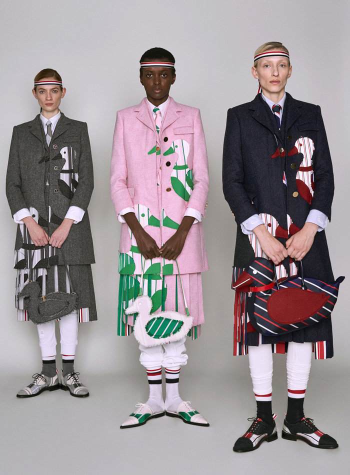 Thom Browne 2019 Pre-Fall Autumn Womens Lookbook Presentation - Ducks Pond Landscape Dog Graphic Motif Embroidery Sporty Preppy Headband Stripes Wool Tweed Quilted Puffer Fur Denim Jeans Parka Military Coat Blazer Patchwork Frayed Raw Hem Sheer Lace Varsity Bomber Jacket Knit Cardigan Check Accordion Pleats Necktie Ribbons Split Half Panel Cargo Pockets 
Handbag Doctor's Bag Pointed Shoes Sneakers Boots
