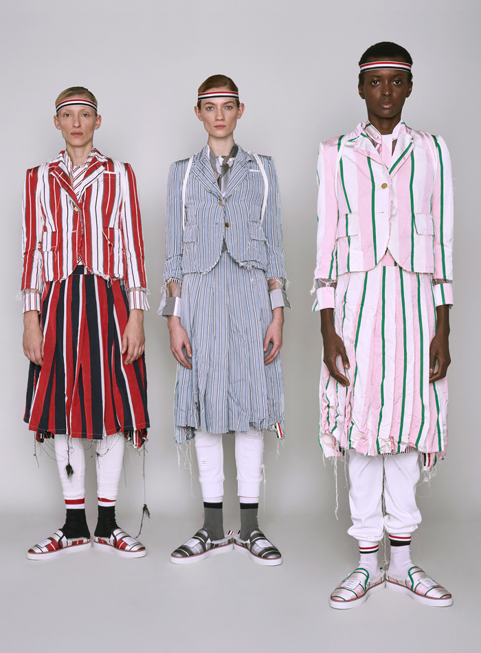 Thom Browne 2019 Pre-Fall Autumn Womens Lookbook Presentation - Ducks Pond Landscape Dog Graphic Motif Embroidery Sporty Preppy Headband Stripes Wool Tweed Quilted Puffer Fur Denim Jeans Parka Military Coat Blazer Patchwork Frayed Raw Hem Sheer Lace Varsity Bomber Jacket Knit Cardigan Check Accordion Pleats Necktie Ribbons Split Half Panel Cargo Pockets 
Handbag Doctor's Bag Pointed Shoes Sneakers Boots
