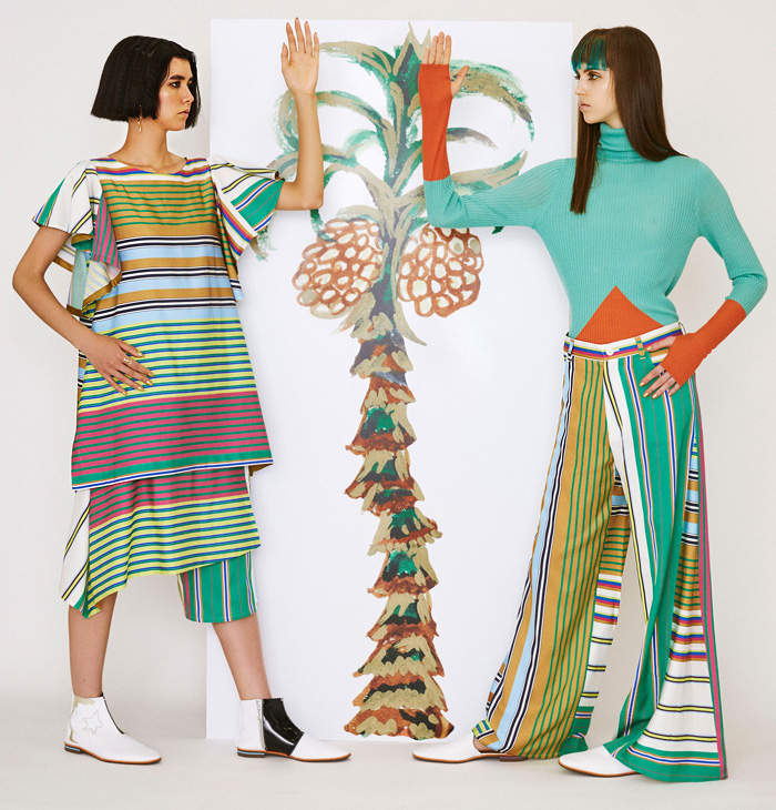 Tsumori Chisato 2019 Resort Cruise Pre-Spring Womens Lookbook Presentation - Egypt King Tut Head Camels Pyramids Snakes Cobra Birds Fish Sphinx Dogs Skateboards Desert Stripes Stars Flowers Floral Ethnic Folk Sheer Chiffon Bedazzled Sequins Cutwork Crepe Wrinkled Accordion Pleats Robe Coat Quilted Bomber Jacket Pantsuit Turtleneck Knit Sweater Shirtdress Caftan Mullet Hem Denim Jeans Skirt Leggings Tights Wide Leg Neck Flap Hat Bag Tote Tassels Boots Sandals Flats Mules Espadrilles