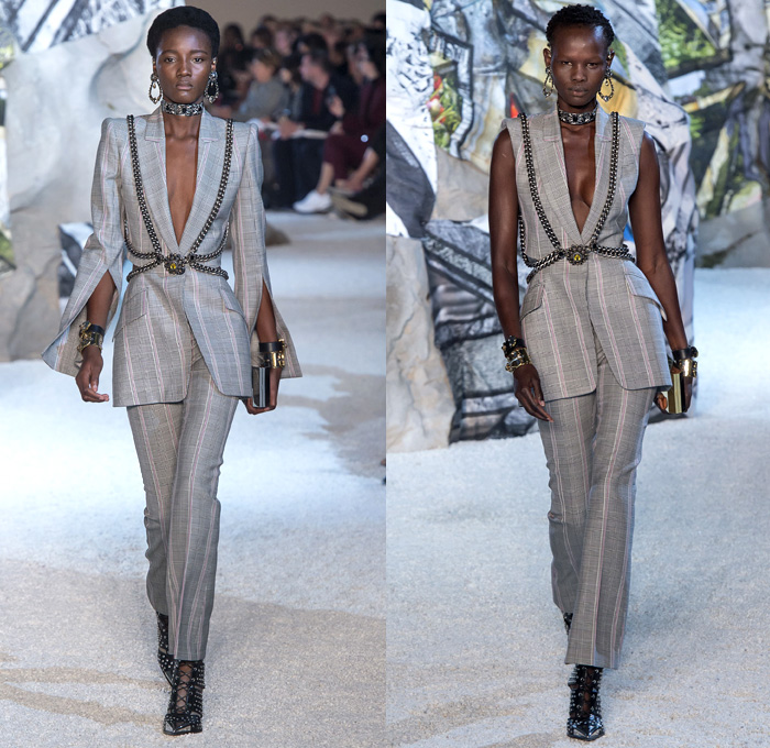 Alexander McQueen 2019 Spring Summer Womens Runway Catwalk Looks Collection Sarah Burton - Mode à Paris Fashion Week France - Armor Sleeves Flowers Floral Laces Hook Eye Caged Corset Strapless Dress Crinoline Lace Guipure Bedazzled Embroidery Silk Tulle Sheer Sequins Trims Slashed Ruffles Relic Charm Harness Tabard Vest Pantsuit Leather Motorcyle Biker Pants Handbag Purse Clutch Studs Boots