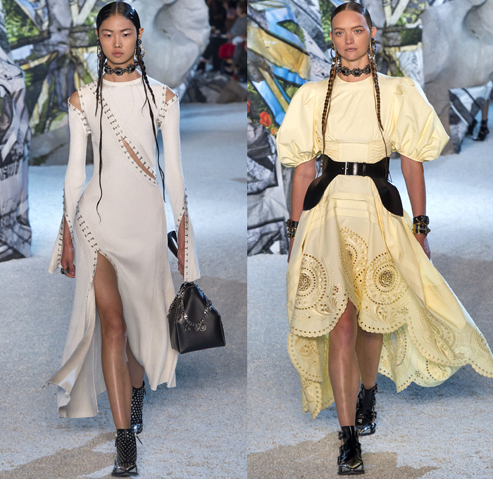 Alexander McQueen 2019 Spring Summer Womens Runway Catwalk Looks Collection Sarah Burton - Mode à Paris Fashion Week France - Armor Sleeves Flowers Floral Laces Hook Eye Caged Corset Strapless Dress Crinoline Lace Guipure Bedazzled Embroidery Silk Tulle Sheer Sequins Trims Slashed Ruffles Relic Charm Harness Tabard Vest Pantsuit Leather Motorcyle Biker Pants Handbag Purse Clutch Studs Boots