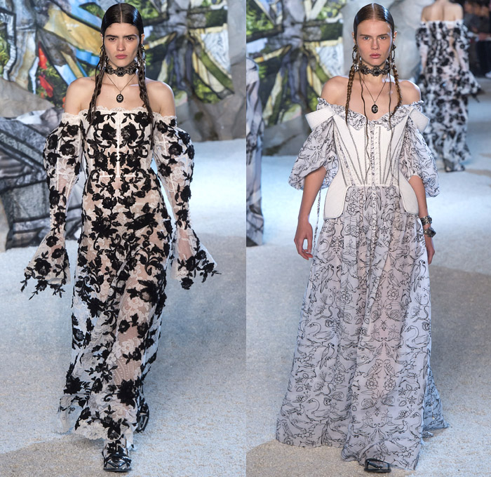 Alexander McQueen 2019 Spring Summer Womens Runway Catwalk Looks Collection Sarah Burton - Mode à Paris Fashion Week France - Armor Sleeves Flowers Floral Laces Hook Eye Caged Corset Strapless Dress Crinoline Lace Guipure Bedazzled Embroidery Silk Tulle Sheer Sequins Trims Slashed Ruffles Relic Charm Harness Tabard Vest Pantsuit Leather Motorcyle Biker Pants Handbag Purse Clutch Studs Boots