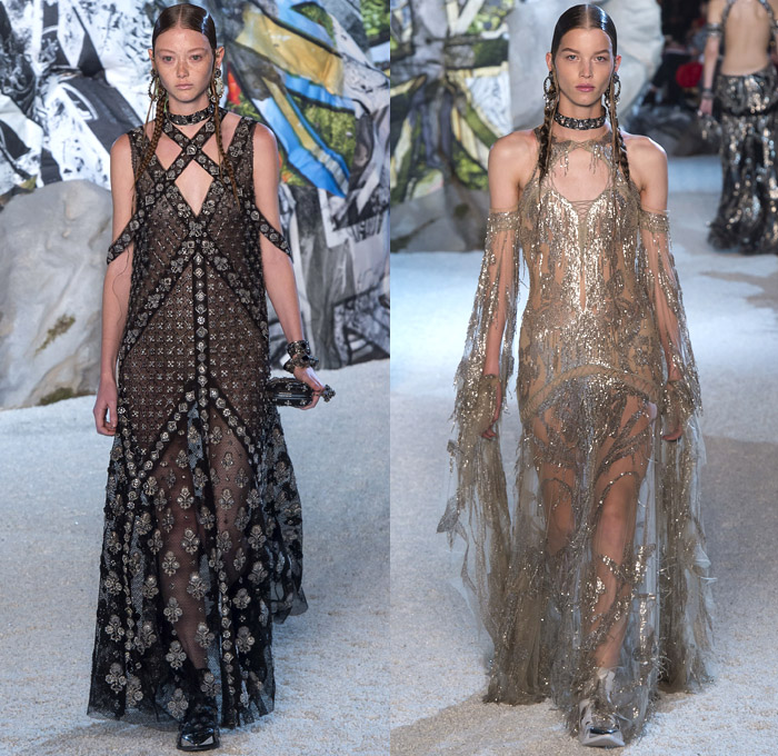 Alexander McQueen 2019 Spring Summer Womens Runway Catwalk Looks Collection Sarah Burton - Mode à Paris Fashion Week France - Armor Sleeves Flowers Floral Laces Hook Eye Caged Corset Strapless Dress Crinoline Lace Guipure Bedazzled Embroidery Silk Tulle Sheer Sequins Trims Slashed Ruffles Relic Charm Harness Tabard Vest Pantsuit Leather Motorcyle Biker Pants Handbag Purse Clutch Studs Boots