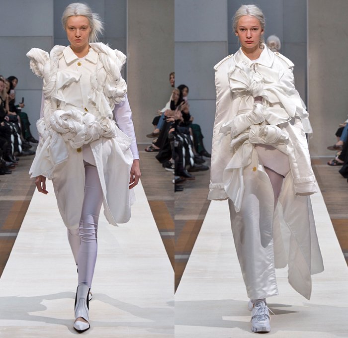 Comme des Garçons 2019 Spring Summer Womens Runway Catwalk Looks Collection - Mode à Paris Fashion Week France - Incision Cracked Protrusion Bump Lump Tumor Bloated Crop Top Elongated Sleeves Chains Logo Mania Tattoo Roses Flowers Floral Dress Newspaper Print Honeycomb Check Feathers Net Fringes Oversized Outerwear Trench Coat Frayed Raw Hem Tied Knot Braid Boots Sneakers