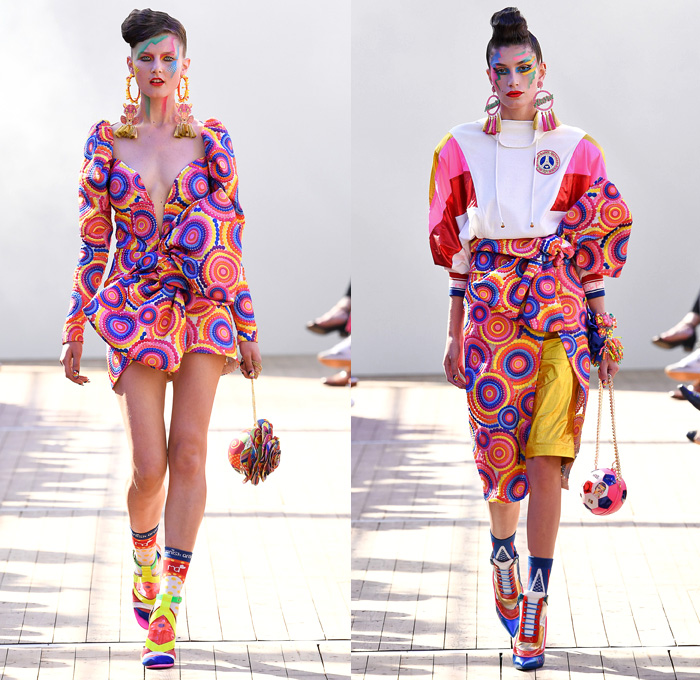 Manish Arora 2019 Spring Summer Womens Runway Catwalk Looks Collection - Mode à Paris Fashion Week France - Panther Love Hearts Bedazzled Sequins Embroidery Swarovski Crystals Ruffled Cinch Skirt Geometric Mix Patterns Decorative Art Sportswear Nylon Trackwear Tassels Strapless Dress Mesh Beads Bomber Jacket Flowers Floral Tie Up Knot Bow Wrap Gown Eveningwear Denim Jeans Wedding Cake Football Soccer Ball Handbag High Tops Sneakers 