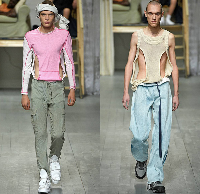 Per Götesson 2019 Spring Summer Mens Runway Catwalk Looks Collection London Fashion Week Mens LFWM - Outerwear Coat Sleeveless Quilted Puffer Down Bubble Vest Slit Hem Knit Sweater Jumper Denim Jeans Jacket Oversized Wide Sleeves Cutoffs Shorts Jorts Leggings Jogger Sweatpants Paper Bag Waist Frayed Raw Hem Cargo Pockets Drawstring Cinch Train Shawl Spoons Forks Utensils Silverware Holes Baseball Cap Head Scarf Sandals Trainers Bum Bag Slingpack