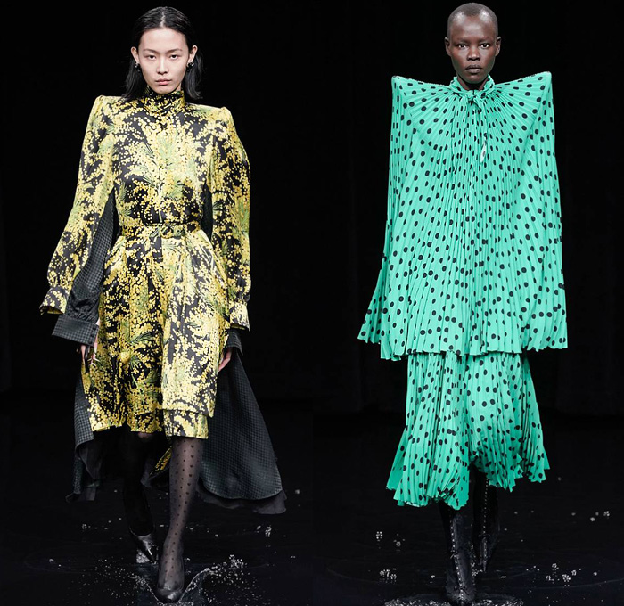 Balenciaga 2020-2021 Fall Autumn Winter Womens Runway Catwalk Looks - Mode à Paris Fashion Week France - Sinister Black Dark Frankenstein Strong Pointy Shoulders Accordion Pleats Tied Knot Flowers Floral Dress Denim Jeans Knit Turtleneck Sweater Midi Skirt Quilted Puffer Trench Coat Pantsuit Blazer Wide Leg Pants Cargo Pockets Pellegrina Cape Fur Body-con Jacket Herringbone Check Wrap Draped Silk Satin Gown Stockings Tights Polka Dots Duffel Bag PVC Vinyl Velvet Sunglasses Boots