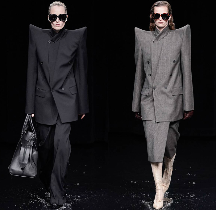 Balenciaga 2020-2021 Fall Autumn Winter Womens Runway Catwalk Looks - Mode à Paris Fashion Week France - Sinister Black Dark Frankenstein Strong Pointy Shoulders Accordion Pleats Tied Knot Flowers Floral Dress Denim Jeans Knit Turtleneck Sweater Midi Skirt Quilted Puffer Trench Coat Pantsuit Blazer Wide Leg Pants Cargo Pockets Pellegrina Cape Fur Body-con Jacket Herringbone Check Wrap Draped Silk Satin Gown Stockings Tights Polka Dots Duffel Bag PVC Vinyl Velvet Sunglasses Boots