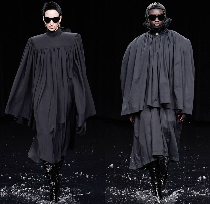 Balenciaga 2020-2021 Fall Autumn Winter Womens Runway Catwalk Looks - Mode à Paris Fashion Week France - Sinister Black Dark Frankenstein Strong Pointy Shoulders Accordion Pleats Tied Knot Flowers Floral Dress Denim Jeans Knit Turtleneck Sweater Midi Skirt Quilted Puffer Trench Coat Pantsuit Blazer Wide Leg Pants Cargo Pockets Pellegrina Cape Fur Body-con Jacket Herringbone Check Wrap Draped Silk Satin Gown Stockings Tights Polka Dots Duffel Bag PVC Vinyl Velvet Sunglasses Boots