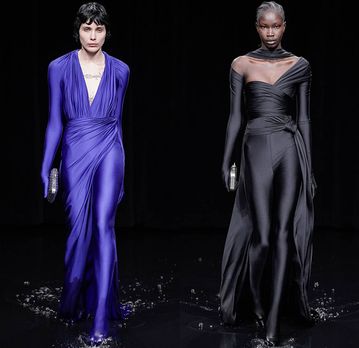 Balenciaga 2020-2021 Fall Autumn Winter Womens Runway Catwalk Looks - Mode à Paris Fashion Week France - Sinister Black Dark Frankenstein Strong Pointy Shoulders Accordion Pleats Tied Knot Flowers Floral Dress Denim Jeans Knit Turtleneck Sweater Midi Skirt Quilted Puffer Trench Coat Pantsuit Blazer Wide Leg Pants Cargo Pockets Pellegrina Cape Fur Body-con Jacket Herringbone Check Wrap Draped Silk Satin Gown Stockings Tights Polka Dots Duffel Bag PVC Vinyl Velvet Sunglasses Boots