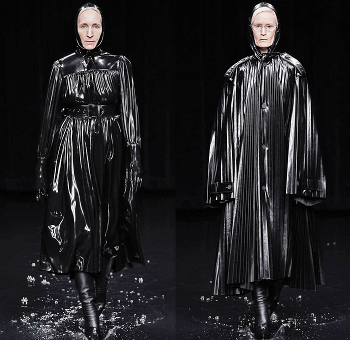 Balenciaga 2020-2021 Fall Autumn Winter Womens Runway Catwalk Looks - Mode à Paris Fashion Week France - Sinister Black Dark Frankenstein Strong Pointy Shoulders Accordion Pleats Tied Knot Flowers Floral Dress Denim Jeans Knit Turtleneck Sweater Midi Skirt Quilted Puffer Trench Coat Pantsuit Blazer Wide Leg Pants Cargo Pockets Pellegrina Cape Fur Body-con Jacket Herringbone Check Wrap Draped Silk Satin Gown Stockings Tights Polka Dots Duffel Bag PVC Vinyl Velvet Sunglasses Boots