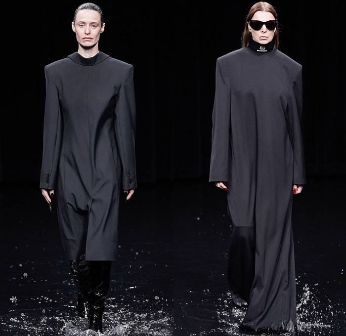 Balenciaga 2020-2021 Fall Autumn Winter Womens Runway Catwalk Looks - Mode à Paris Fashion Week France - Sinister Black Dark Frankenstein Strong Pointy Shoulders Accordion Pleats Tied Knot Flowers Floral Dress Denim Jeans Knit Turtleneck Sweater Midi Skirt Quilted Puffer Trench Coat Pantsuit Blazer Wide Leg Pants Cargo Pockets Pellegrina Cape Fur Body-con Jacket Herringbone Check Wrap Draped Silk Satin Gown Stockings Tights Polka Dots Duffel Bag PVC Vinyl Velvet Sunglasses Boots