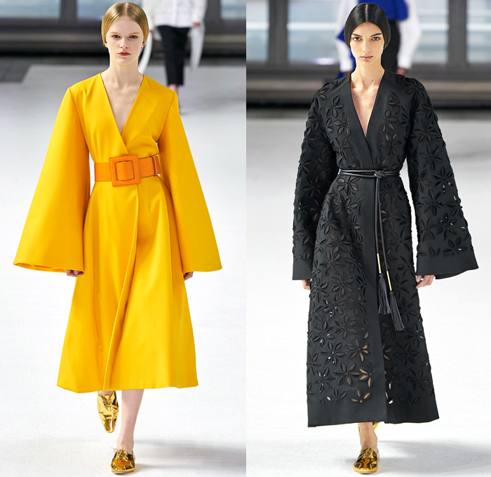 Carolina Herrera 2020-2021 Fall Autumn Winter Womens Runway Catwalk Looks - New York Fashion Week NYFW - Cape Robe Coat Perforated Holes Flowers Floral Lace Embroidery Jacquard Print Maxi Dress Gown Wide Leg O'Mutton Bell Sleeves Elongated Wrist Cuff Straps Silk Satin Strapless One Shoulder Draped Tiered Ruffles Sheer Tulle Tied Ribbon Rope Waist Tassels Hanging Sleeve Turtleneck Pantsuit Slouchy Pants Wide Belt Boots Sandals Gold Metallic Brogues 