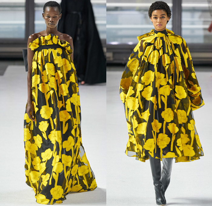 Carolina Herrera 2020-2021 Fall Autumn Winter Womens Runway Catwalk Looks - New York Fashion Week NYFW - Cape Robe Coat Perforated Holes Flowers Floral Lace Embroidery Jacquard Print Maxi Dress Gown Wide Leg O'Mutton Bell Sleeves Elongated Wrist Cuff Straps Silk Satin Strapless One Shoulder Draped Tiered Ruffles Sheer Tulle Tied Ribbon Rope Waist Tassels Hanging Sleeve Turtleneck Pantsuit Slouchy Pants Wide Belt Boots Sandals Gold Metallic Brogues 