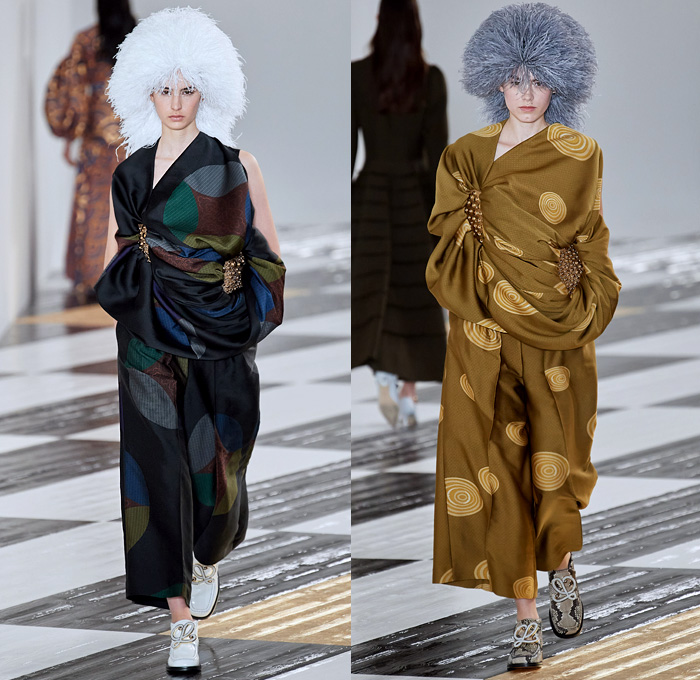 Loewe 2020-2021 Fall Autumn Winter Womens Runway Catwalk Looks - Paris Fashion Week Femme PFW Jonathan Anderson - Takuro Kuwata Ceramic Sculpture Pieces Studs Bedazzled Gems Jewels Oversized Lapel Double Breasted Coat Poncho Capelet Fur Feathers Headwear Hanging Sleeve Check Frayed Jacquard Brocade Dress Decorative Art Leaves Foliage Shrimp Prawn Geometric Print Pantsuit Drawstring Peplum Frankenstein Shoulders Wide Leg Parachute Pants Handbag Heels Trainers Snakeskin Loafers 