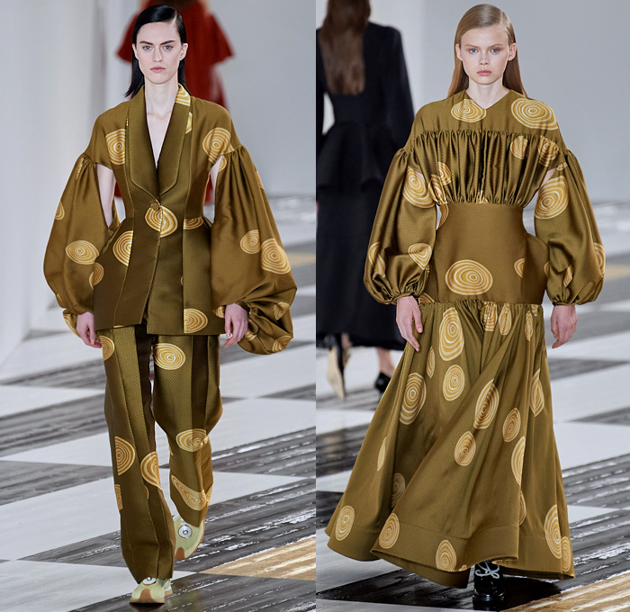 Loewe 2020-2021 Fall Autumn Winter Womens Runway Catwalk Looks - Paris Fashion Week Femme PFW Jonathan Anderson - Takuro Kuwata Ceramic Sculpture Pieces Studs Bedazzled Gems Jewels Oversized Lapel Double Breasted Coat Poncho Capelet Fur Feathers Headwear Hanging Sleeve Check Frayed Jacquard Brocade Dress Decorative Art Leaves Foliage Shrimp Prawn Geometric Print Pantsuit Drawstring Peplum Frankenstein Shoulders Wide Leg Parachute Pants Handbag Heels Trainers Snakeskin Loafers 