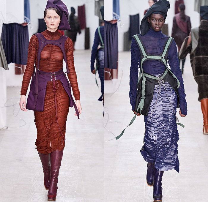 Richard Malone 2020-2021 Fall Autumn Winter Womens Runway Catwalk Looks - London Fashion Week Collections UK - Cinch Sheer Chiffon Organza Dress Harness Straps Tied Tool Belt Cargo Utility Flap Pockets Turtleneck Knit Cutout Sweater One Shoulder Strapless Wrap Pantsuit Jacket Blazer Long Skirt Flare Pants Patchwork Satchel Leather Coat Plush Fur Tabard Zipper Poufy Shoulders Silk Satin Accordion Pleats Sculptural Curved Gown Draped Beret Boots