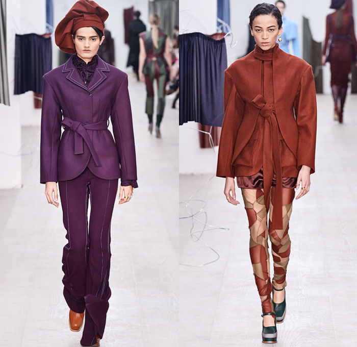 Richard Malone 2020-2021 Fall Autumn Winter Womens Runway Catwalk Looks - London Fashion Week Collections UK - Cinch Sheer Chiffon Organza Dress Harness Straps Tied Tool Belt Cargo Utility Flap Pockets Turtleneck Knit Cutout Sweater One Shoulder Strapless Wrap Pantsuit Jacket Blazer Long Skirt Flare Pants Patchwork Satchel Leather Coat Plush Fur Tabard Zipper Poufy Shoulders Silk Satin Accordion Pleats Sculptural Curved Gown Draped Beret Boots