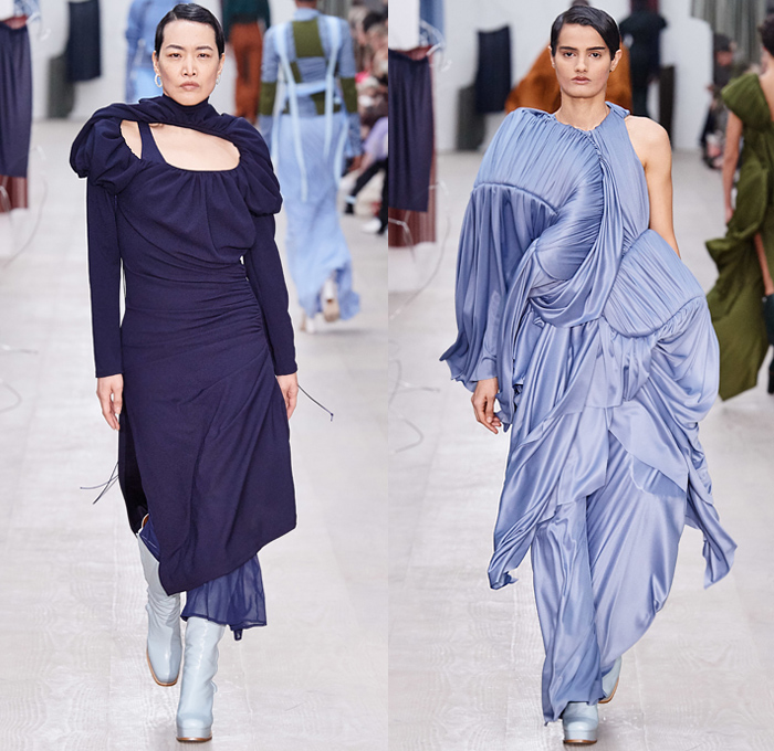 Richard Malone 2020-2021 Fall Autumn Winter Womens Runway Catwalk Looks - London Fashion Week Collections UK - Cinch Sheer Chiffon Organza Dress Harness Straps Tied Tool Belt Cargo Utility Flap Pockets Turtleneck Knit Cutout Sweater One Shoulder Strapless Wrap Pantsuit Jacket Blazer Long Skirt Flare Pants Patchwork Satchel Leather Coat Plush Fur Tabard Zipper Poufy Shoulders Silk Satin Accordion Pleats Sculptural Curved Gown Draped Beret Boots