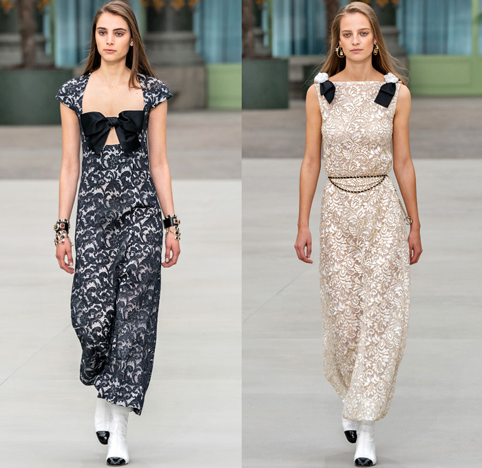 Chanel 2020 Resort Cruise Pre-Spring Womens Runway Catwalk Looks Collection Paris Grand Palais - Mom Chic Clocks Tweed Jacket Trench Coat Giant Bow Chain Knit Cardigan Cargo Pockets Cap Sleeve Bib Leather Bedazzled Beads Lace Embroidery Plaid Check Trompe L'oeil Flowers Floral Miniskirt Motorcycle Biker Vest Tabard Gloves Jumpsuit Coveralls Logo Mania Cuffs Tiered Ruffles Sheer Chiffon Halterneck Wide Leg Low Crotch Cropped Palazzo Sailor Pants Shorts Quilted Fanny Pack Bum Bag