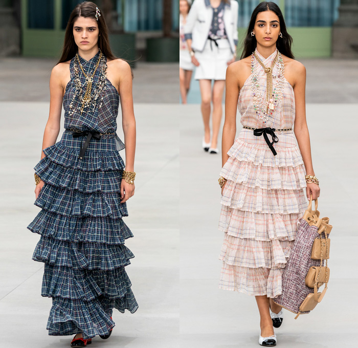 Chanel 2020 Resort Cruise Pre-Spring Womens Runway Catwalk Looks Collection Paris Grand Palais - Mom Chic Clocks Tweed Jacket Trench Coat Giant Bow Chain Knit Cardigan Cargo Pockets Cap Sleeve Bib Leather Bedazzled Beads Lace Embroidery Plaid Check Trompe L'oeil Flowers Floral Miniskirt Motorcycle Biker Vest Tabard Gloves Jumpsuit Coveralls Logo Mania Cuffs Tiered Ruffles Sheer Chiffon Halterneck Wide Leg Low Crotch Cropped Palazzo Sailor Pants Shorts Quilted Fanny Pack Bum Bag