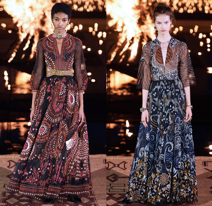 Christian Dior 2020 Resort Cruise Pre-Spring Womens Runway Catwalk Looks Collection Marrakech Morocco - African Wax Illustration Ornamental Tropical Prints Mythology Garden Flowers Floral Birds Tribal Poncho Coat Parka Fringes Headband Blouse Camouflage Bib Armor Accordion Pleats Sheer Chiffon Lace Cutwork Bedazzled Embroidery Sleeveless Halterneck Strapless Knot Bow Frayed Maxi Dress Gown Wide Leg Bleached Acid Wash Denim Jeans Jumpsuit Long Skirt Boots Handbag Basket Tote