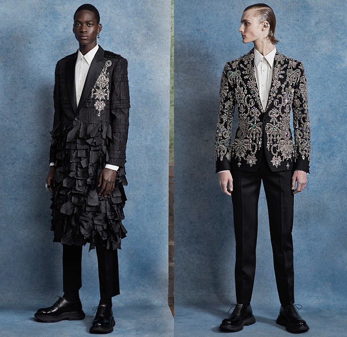 Alexander McQueen 2020 Spring Summer Mens Lookbook Presentation London Fashion Week Mens LFWM - 1990s Nineties Japan Sartorial Suit Blazer Jacket Abstract Rorschach Flowers Floral Double Lapel Pinstripe Lace Cutwork Mesh Long Sleeve Shirt Half Kilt Skirt Panel Accordion Pleats Bedazzled Crystals Gems Jewels Neck Tie Fringes Cropped Pants Sneaker Boots