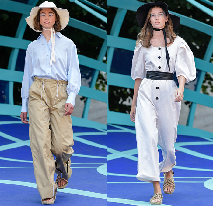 Designers Remix 2020 Spring Summer Womens Runway Catwalk Looks Collection - Copenhagen Fashion Week Denmark CPHFW København - Skyscape Trench Coat Gloves Pantsuit Silk Satin Blazer Capelet Shirtdress Blouse Strapless Noodle Strap Dress Sky Clouds Print Robe Tied Waist Knot Asymmetrical Hem Cinch Drawstring Poufy Shoulders Picnic Check Plaid Ruffles Swirls Knit Wide Leg Slouchy Pants Floppy Hat Rope Sandals Flour Sack Bag