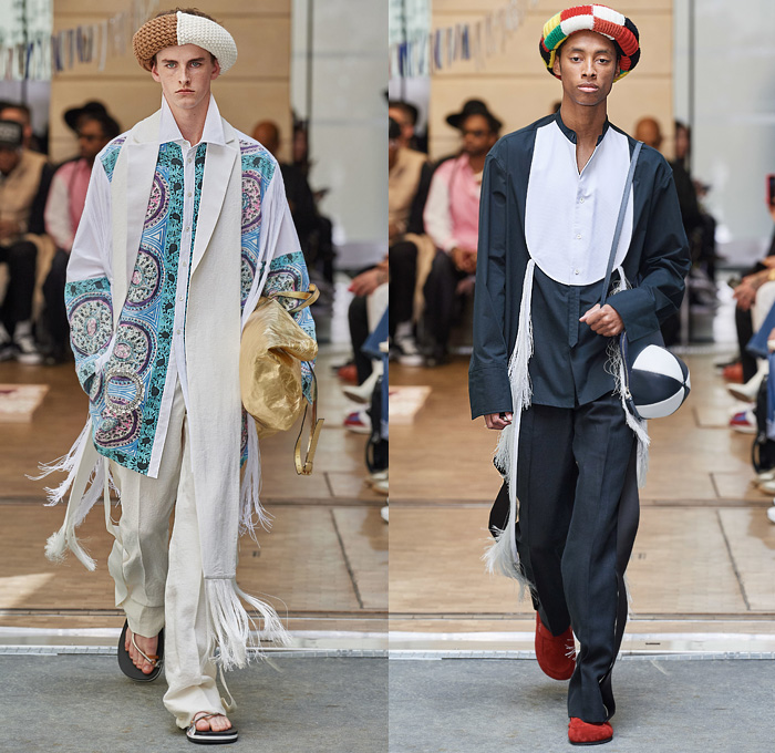 JW Anderson 2020 Spring Summer Mens Runway Looks Collection Paris Fashion Week Homme France FHCM - Manta Ray Fins Wings Cape Headband Knit Crochet Threads Cardigan Vest Trench Coat Drawings Knights Horses Hanging Sleeve Sweatshirt Lapelscarf Fringes Stripes Check Patchwork Decorative Art Long Sleeve Shirt Wide Leg Pants Loungewear Culottes Gold Tote Cap Bag Slippers Loafers 