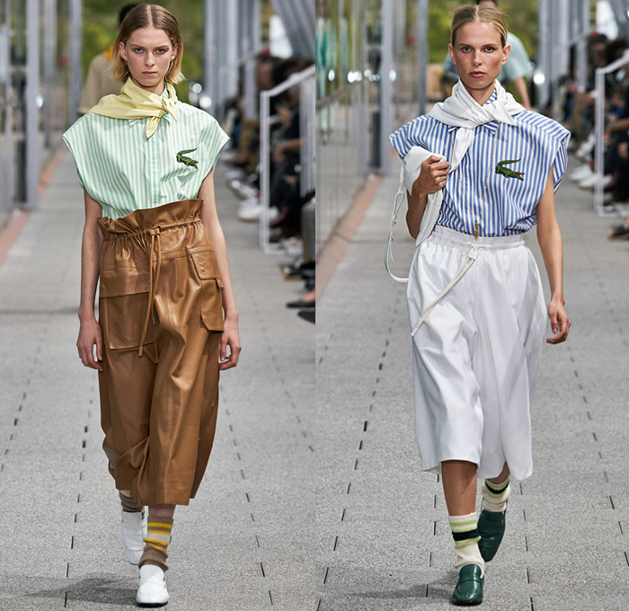 Lacoste 2020 Spring Summer Womens Runway Catwalk Looks Collection - Mode à Paris Fashion Week France - Tennis Court Stripes Slouchy Sporty Neck Scarf Sleeveless Blouse Paper Bag Waist Drawstring Wide Leg Culottes Color Block Knit Mesh Sweater Check Polo Shirt Accordion Pleats Skirt Track Pants Zipper Shirtdress Onesie Cargo Pockets Parkadress Anorakdress Tearaway Snap Buttons Diamond Shape Trench Coat Polished Leather Handbag Tote Loafers Sneakers