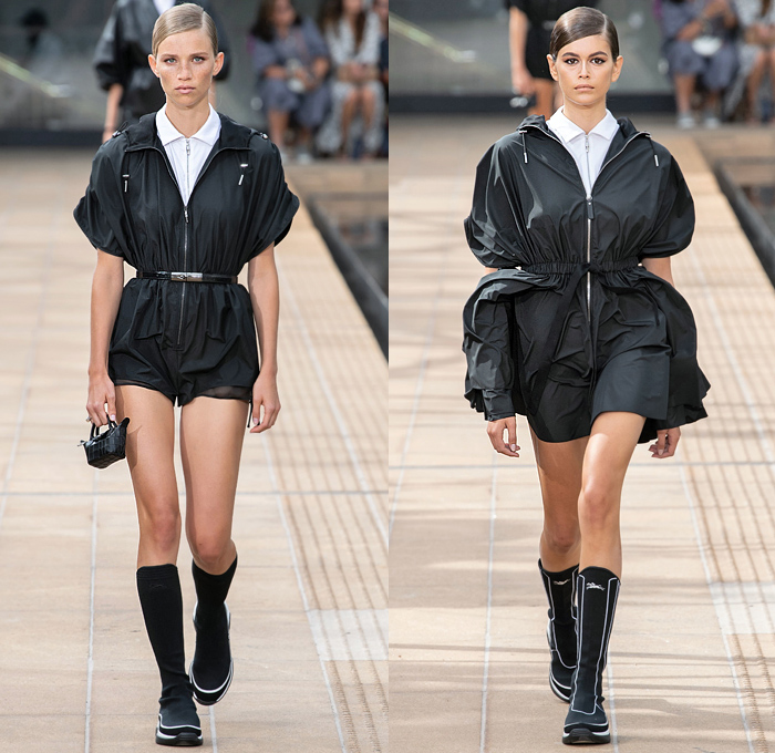 Longchamp 2020 Spring Summer Womens Runway Catwalk Looks Collection Sophie Delafontaine - New York Fashion Week NYFW - Sporty Wide Sleeve Blouse Cinch Accordion Pleats Crop Top Midriff Stripes Onesie Romper Combishorts Jumpsuit Coveralls Kimono Blazer Sheer Chiffon Tulle Trackwear Strapless Colorblock Shirtdress Draped Angular Hem Trompe L'oeil Flowers Floral Embroidery Needlework Hotpants Miniskirt Dress Gladiator Sock Stocking Boot Sneaker Hybrid Handbag Micro Mini Bag