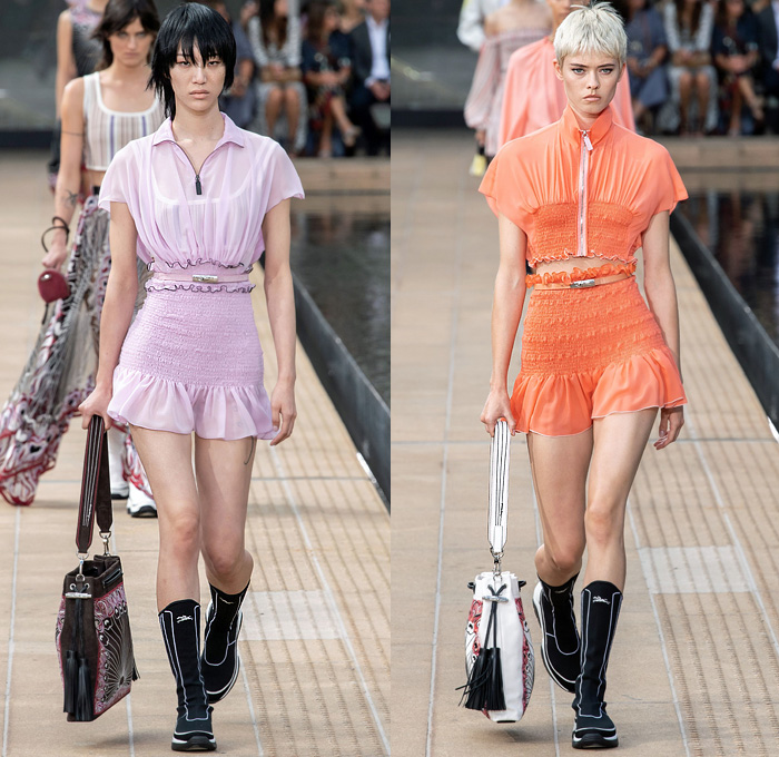 Longchamp 2020 Spring Summer Womens Runway Catwalk Looks Collection Sophie Delafontaine - New York Fashion Week NYFW - Sporty Wide Sleeve Blouse Cinch Accordion Pleats Crop Top Midriff Stripes Onesie Romper Combishorts Jumpsuit Coveralls Kimono Blazer Sheer Chiffon Tulle Trackwear Strapless Colorblock Shirtdress Draped Angular Hem Trompe L'oeil Flowers Floral Embroidery Needlework Hotpants Miniskirt Dress Gladiator Sock Stocking Boot Sneaker Hybrid Handbag Micro Mini Bag