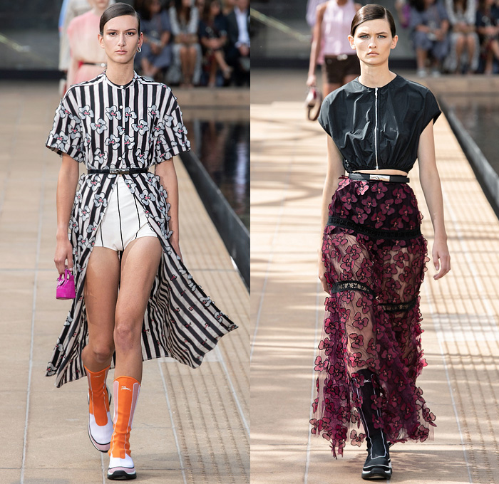 Longchamp 2020 Spring Summer Womens Runway Catwalk Looks Collection Sophie Delafontaine - New York Fashion Week NYFW - Sporty Wide Sleeve Blouse Cinch Accordion Pleats Crop Top Midriff Stripes Onesie Romper Combishorts Jumpsuit Coveralls Kimono Blazer Sheer Chiffon Tulle Trackwear Strapless Colorblock Shirtdress Draped Angular Hem Trompe L'oeil Flowers Floral Embroidery Needlework Hotpants Miniskirt Dress Gladiator Sock Stocking Boot Sneaker Hybrid Handbag Micro Mini Bag