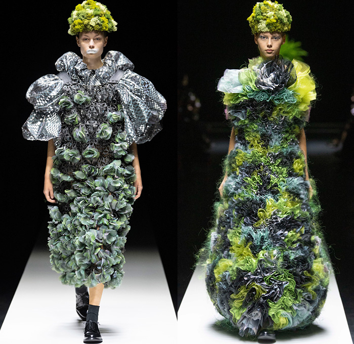 Noir Kei Ninomiya 2020 Spring Summer Womens Runway Catwalk Looks Collection - Mode à Paris Fashion Week France - Sculpture Cocoon Clouds Sheer Tulle Ruffles Tiered Furry Spikes Broccoli Grass Headwear Coral Mask Trompe L'oeil Lace Embroidery Needlework Flowers Floral Leaves Foliage Harness Straps Belts Pussycat Bow Ribbons Fringes Loops Mesh Shrub Perforated Racing Check Poufy Shoulders Pinafore Dress  Pins Needles Chandelier Gown Hoodie Trench Coat Motorcycle Biker Leather Jacket 