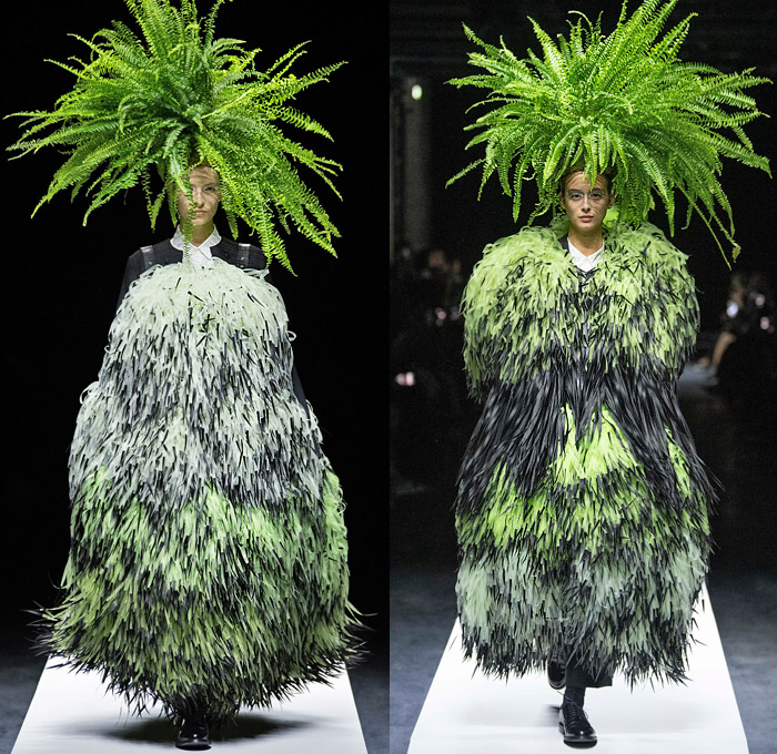 Noir Kei Ninomiya 2020 Spring Summer Womens Runway Catwalk Looks Collection - Mode à Paris Fashion Week France - Sculpture Cocoon Clouds Sheer Tulle Ruffles Tiered Furry Spikes Broccoli Grass Headwear Coral Mask Trompe L'oeil Lace Embroidery Needlework Flowers Floral Leaves Foliage Harness Straps Belts Pussycat Bow Ribbons Fringes Loops Mesh Shrub Perforated Racing Check Poufy Shoulders Pinafore Dress  Pins Needles Chandelier Gown Hoodie Trench Coat Motorcycle Biker Leather Jacket 