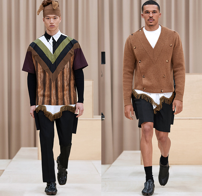 Burberry 2021-2022 Fall Autumn Winter Mens Runway Looks - London Fashion Week Mens Collections UK - Riccardo Tisci - Escapes - Trench Duffle Coat Parka Hoodie Fur Varsity Jacket 8-Point Star Fringes Gold Trims Patchwork Knit Cap Beanie Chevron Stripes Flaps Marching Band Sweater V-Neck Shorts Cap Sleeve Vest Manskirt Kilt Wood Pattern Mandress Shirtdress Accordion Pleats Arm Warmers Quilted Logo Check Bedazzled Gems Jewels Boots