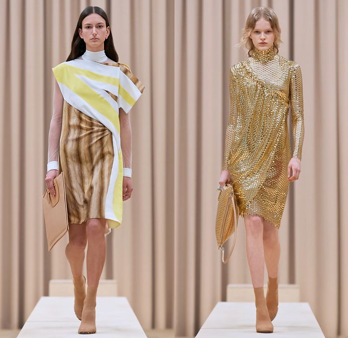 Burberry 2021-2022 Fall Autumn Winter Womens Runway Catwalk Looks - Riccardo Tisci - Femininity - Fez Ushanka Hat Ear Flaps Wide Draped Sleeves 8 Point Star Octagram Dress Gold Coins Mesh Capelet Pellegrina Arm Warmers Handkerchief Hem Wood Fur Print Sheer Tulle Chiffon Turtleneck Blouse Strips Fringes Shirtdress Geometric Check Patchwork Panels One Shoulder Metal Rings Grommets Cinch Pleats Trench Coat Poncho Shorts Rabbit Tail Peel Away Sequins Handbag Folder Mask Sunglasses Boots