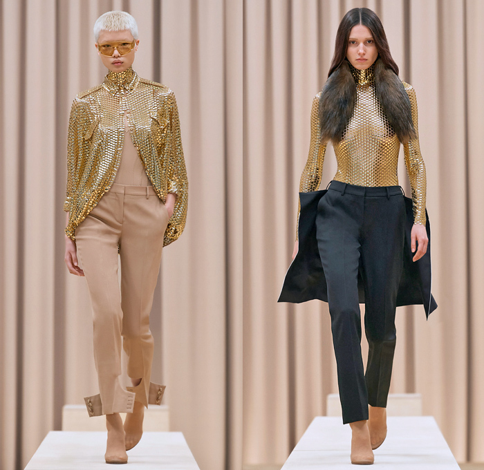 Burberry 2021-2022 Fall Autumn Winter Womens Runway Catwalk Looks - Riccardo Tisci - Femininity - Fez Ushanka Hat Ear Flaps Wide Draped Sleeves 8 Point Star Octagram Dress Gold Coins Mesh Capelet Pellegrina Arm Warmers Handkerchief Hem Wood Fur Print Sheer Tulle Chiffon Turtleneck Blouse Strips Fringes Shirtdress Geometric Check Patchwork Panels One Shoulder Metal Rings Grommets Cinch Pleats Trench Coat Poncho Shorts Rabbit Tail Peel Away Sequins Handbag Folder Mask Sunglasses Boots