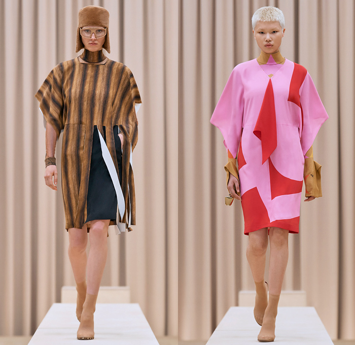 Burberry 2021-2022 Fall Autumn Winter Womens Runway Catwalk Looks - Riccardo Tisci - Femininity - Fez Ushanka Hat Ear Flaps Wide Draped Sleeves 8 Point Star Octagram Dress Gold Coins Mesh Capelet Pellegrina Arm Warmers Handkerchief Hem Wood Fur Print Sheer Tulle Chiffon Turtleneck Blouse Strips Fringes Shirtdress Geometric Check Patchwork Panels One Shoulder Metal Rings Grommets Cinch Pleats Trench Coat Poncho Shorts Rabbit Tail Peel Away Sequins Handbag Folder Mask Sunglasses Boots