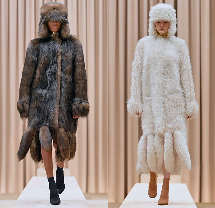 Burberry 2021-2022 Fall Autumn Winter Womens Runway Catwalk Looks - Riccardo Tisci - Femininity - Fez Ushanka Hat Ear Flaps Wide Draped Sleeves 8 Point Star Octagram Dress Gold Coins Mesh Capelet Pellegrina Arm Warmers Handkerchief Hem Wood Fur Print Sheer Tulle Chiffon Turtleneck Blouse Strips Fringes Shirtdress Geometric Check Patchwork Panels One Shoulder Metal Rings Grommets Cinch Pleats Trench Coat Poncho Shorts Rabbit Tail Peel Away Sequins Handbag Folder Mask Sunglasses Boots