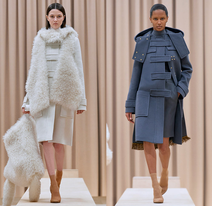 Burberry 2021-2022 Fall Autumn Winter Womens Runway Catwalk Looks - Riccardo Tisci - Femininity - Fez Ushanka Hat Ear Flaps Wide Draped Sleeves 8 Point Star Octagram Dress Gold Coins Mesh Capelet Pellegrina Arm Warmers Handkerchief Hem Wood Fur Print Sheer Tulle Chiffon Turtleneck Blouse Strips Fringes Shirtdress Geometric Check Patchwork Panels One Shoulder Metal Rings Grommets Cinch Pleats Trench Coat Poncho Shorts Rabbit Tail Peel Away Sequins Handbag Folder Mask Sunglasses Boots