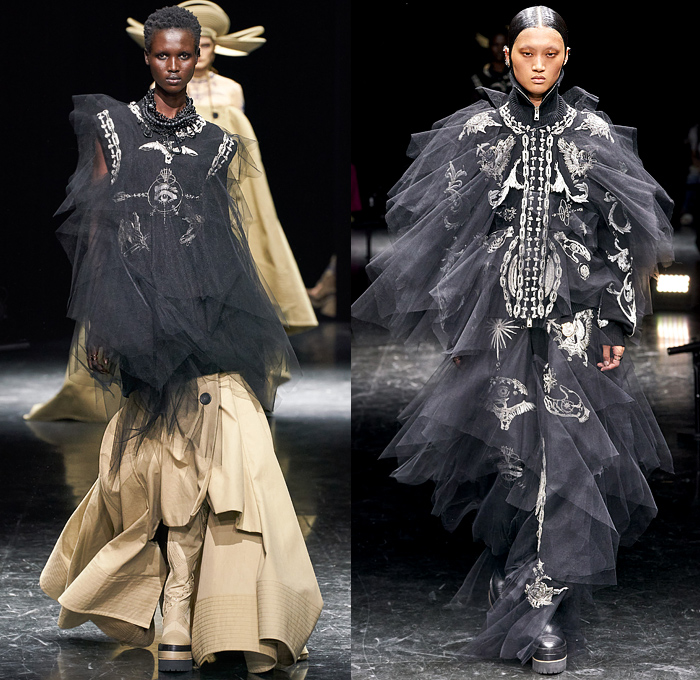 Jean Paul Gaultier 2021-2022 Fall Autumn Winter Womens Runway Looks - Haute Couture High Fashion - Enfants Terribles - Sacai Chitose Abe Collaboration - Chapkas Hat Corset Fur Satin Tulle Deconstructed Hybrid Tattoo Jewellery Denim Jeans Knit Patchwork Cape Stripes Sweater Plaid Check Vest Pinstripe Knee Pads Blazer Flare Safety Pins Metal Studs Shirtdress Conical Bra Trench Dress Strapless Marching Band Motorcycle Biker Bomber Jacket Quilted Puffer Dress Gown Fringes Jogging Suit Boots