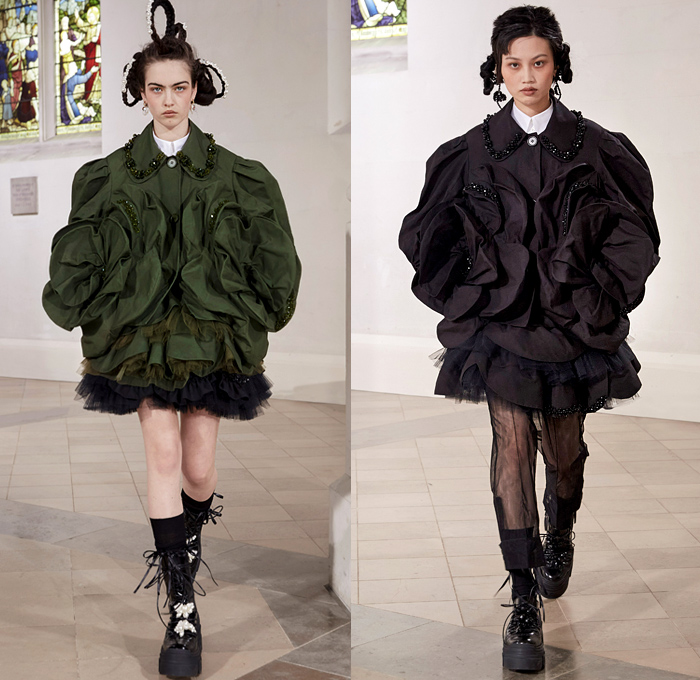 Simone Rocha 2021-2022 Fall Autumn Winter Womens Runway Catwalk Looks - London Fashion Week Collections UK - Fragile Rebel 3D Satin Roses Flowers Floral Trompe L'oeil Edwardian Balloon Sleeves Poufy Puff Shoulders Motorcycle Biker Jacket Tiered Voluminous Ruffles Lace Embroidery Sheer Tulle Pink Black Leather Bedazzled Pearls Crystals Gemstones Harness Brocade Babydoll Pinafore Dress Coat Blazer Blouse Patchwork Pleats Cardigan Tights Leggings Ties Shorts Platform Sneakers Handbag