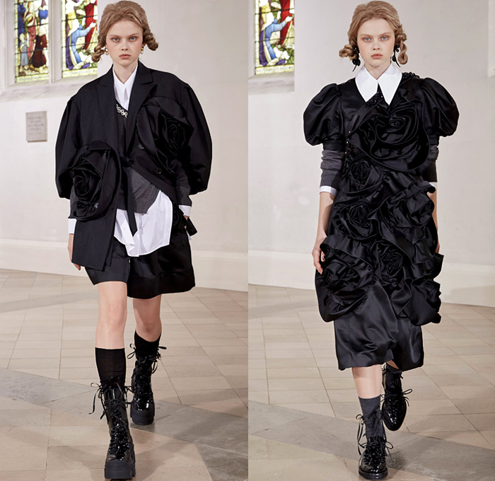 Simone Rocha 2021-2022 Fall Autumn Winter Womens Runway Catwalk Looks - London Fashion Week Collections UK - Fragile Rebel 3D Satin Roses Flowers Floral Trompe L'oeil Edwardian Balloon Sleeves Poufy Puff Shoulders Motorcycle Biker Jacket Tiered Voluminous Ruffles Lace Embroidery Sheer Tulle Pink Black Leather Bedazzled Pearls Crystals Gemstones Harness Brocade Babydoll Pinafore Dress Coat Blazer Blouse Patchwork Pleats Cardigan Tights Leggings Ties Shorts Platform Sneakers Handbag