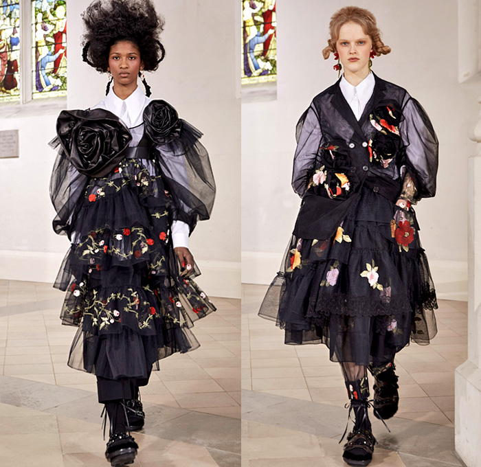 Simone Rocha 2021-2022 Fall Autumn Winter Womens Runway Catwalk Looks - London Fashion Week Collections UK - Fragile Rebel 3D Satin Roses Flowers Floral Trompe L'oeil Edwardian Balloon Sleeves Poufy Puff Shoulders Motorcycle Biker Jacket Tiered Voluminous Ruffles Lace Embroidery Sheer Tulle Pink Black Leather Bedazzled Pearls Crystals Gemstones Harness Brocade Babydoll Pinafore Dress Coat Blazer Blouse Patchwork Pleats Cardigan Tights Leggings Ties Shorts Platform Sneakers Handbag