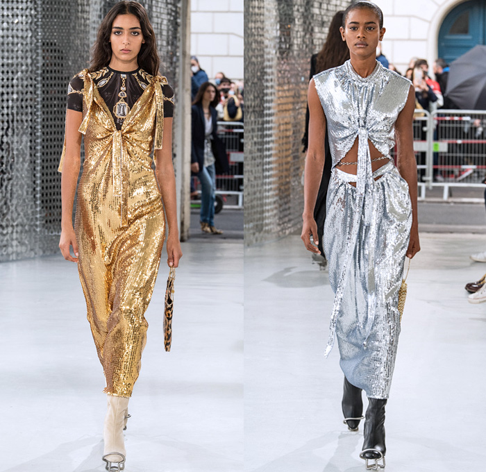 Paco Rabanne 2021 Spring Summer Womens Runway Catwalk Looks Collection - Mode à Paris Fashion Week France - Streets Medieval Chainmail Mesh Bedazzled Gems Jewels Discs Assemblage Metal Plates Armor Sequins Beads Bralette Lingerie Intimates Dress Lace Embroidery Leopard Cheetah Flowers Floral Knit Turtleneck Sweater Plastic Trench Coat Capelet Corset Gown Tied zipper Stripes Plaid Check Slit Holes Drum Corps Marching Band Vest Purse Handbag Steel Rod Heels Boots